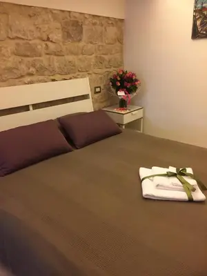 Letto o letti in una camera di House Garden Modica