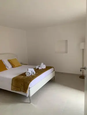Letto o letti in una camera di Cutelli Gold