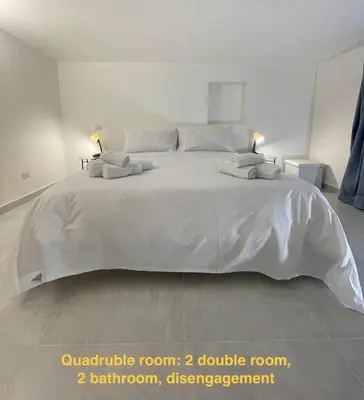 Letto o letti in una camera di Cutelli Gold