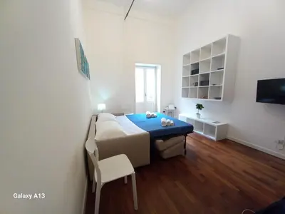 Letto o letti in una camera di LA TERRAZZA DI DIONE
