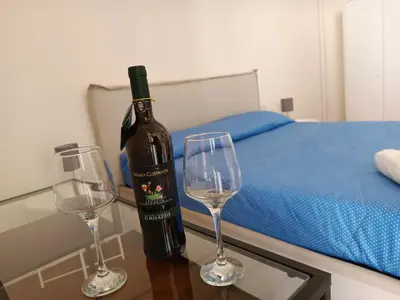 Letto o letti in una camera di LA TERRAZZA DI DIONE