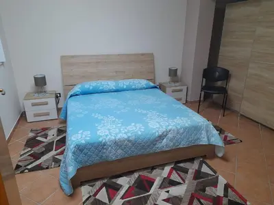 Letto o letti in una camera di Casa vacanze a 2 minuti dal mare