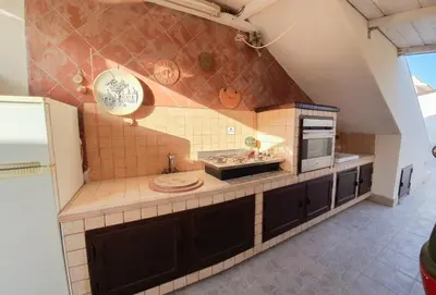 Cucina o angolo cottura di Villa La Sosta - 150m dal mare - Patio Privato e Areal Relax