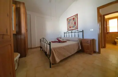 Letto o letti in una camera di Villa La Sosta - 150m dal mare - Patio Privato e Areal Relax