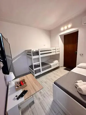 Letto o letti in una camera di Airport Al Volo B&B