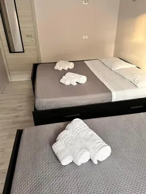 Letto o letti in una camera di Airport Al Volo B&B