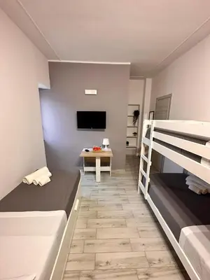 Letto o letti in una camera di Airport Al Volo B&B