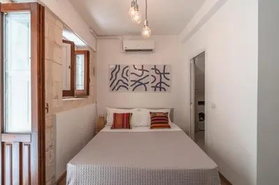 Letto o letti in una camera di Dione terrace apartments by Dimore in Sicily