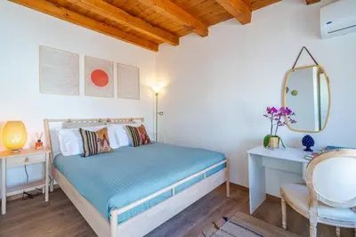 Letto o letti in una camera di Dione terrace apartments by Dimore in Sicily