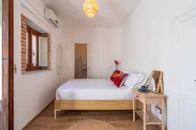 Letto o letti in una camera di Dione terrace apartments by Dimore in Sicily