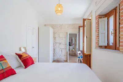 Letto o letti in una camera di Dione terrace apartments by Dimore in Sicily