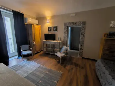 Area soggiorno di Caruso Ortigia Apartments