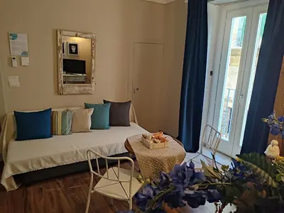 Letto o letti in una camera di Caruso Ortigia Apartments