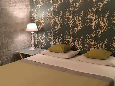 Letto o letti in una camera di Caruso Ortigia Apartments
