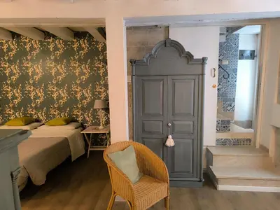 Letto o letti in una camera di Caruso Ortigia Apartments