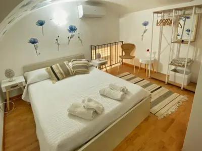 Letto o letti in una camera di NiceHouse