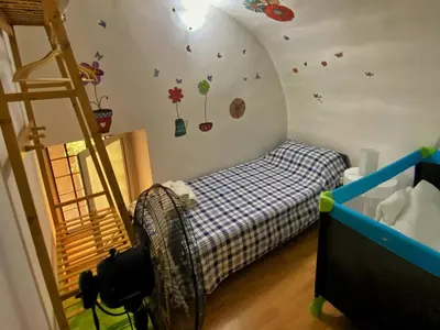 Letto o letti in una camera di NiceHouse